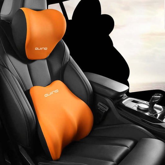 Car neck pillow support set in orange color, featuring ergonomic design for headrest and lumbar support in a luxury car interior.