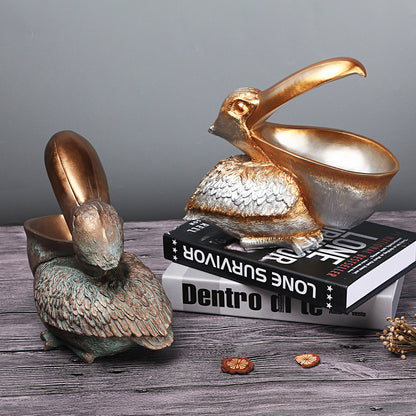 Storage of resin ornaments for pelicans with large beaks