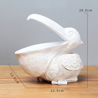 Storage of resin ornaments for pelicans with large beaks