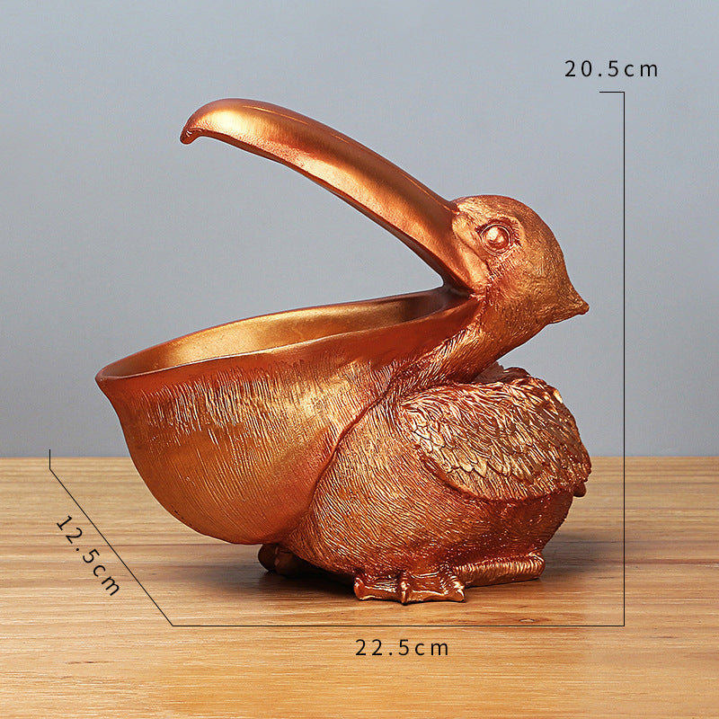 Storage of resin ornaments for pelicans with large beaks