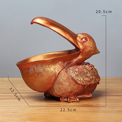 Storage of resin ornaments for pelicans with large beaks