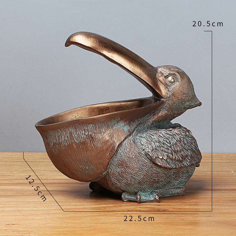 Storage of resin ornaments for pelicans with large beaks