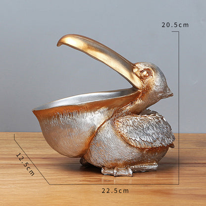 Storage of resin ornaments for pelicans with large beaks