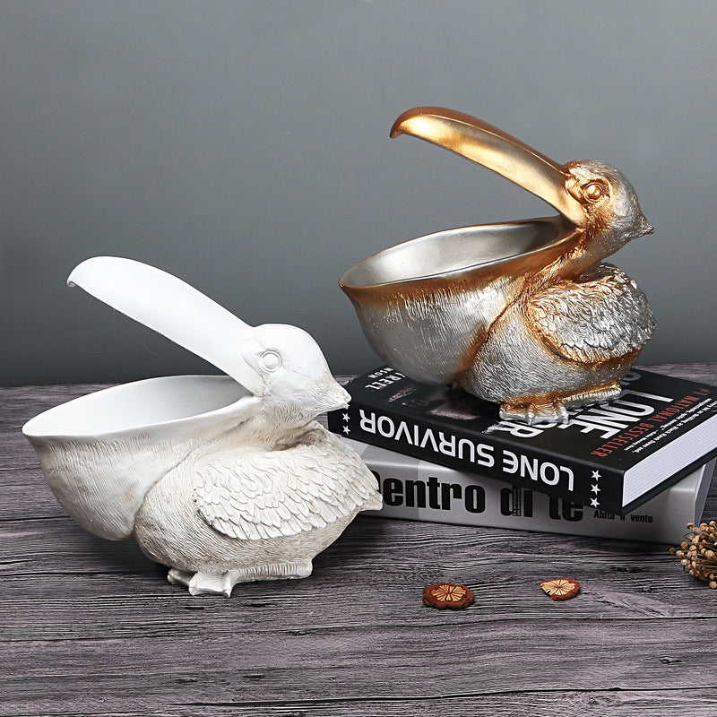 Storage of resin ornaments for pelicans with large beaks